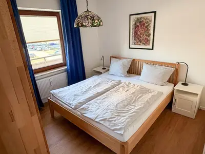Ein Bett oder Betten in einem Zimmer der Unterkunft Haus Nordseeblick Wohnung 23