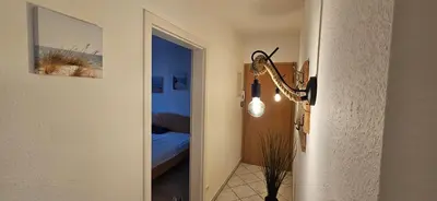 Ein Bett oder Betten in einem Zimmer der Unterkunft Seeschwalbe