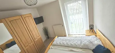 Ein Bett oder Betten in einem Zimmer der Unterkunft Seeschwalbe