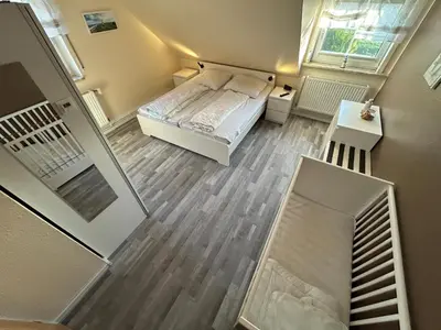 Ein Bett oder Betten in einem Zimmer der Unterkunft Ferienhaus Seedeich Lea - Friedrichskoog Nordsee