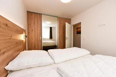 Ein Bett oder Betten in einem Zimmer der Unterkunft Haus 