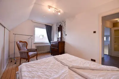 Ein Bett oder Betten in einem Zimmer der Unterkunft Haus 