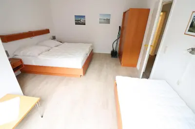 Ein Bett oder Betten in einem Zimmer der Unterkunft Wohnung 2 im Haus Itjen