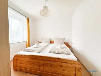 Ein Bett oder Betten in einem Zimmer der Unterkunft Haus Nordseeblick Wohnung 1