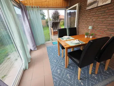 Ein Sitzbereich in der Unterkunft Ferienhaus Gänseblümchen