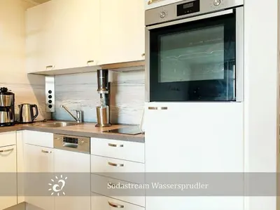 Küche/Küchenzeile in der Unterkunft De Swolk Nordseeblick vom Balkon