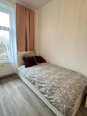 Ein Bett oder Betten in einem Zimmer der Unterkunft Apartments Brunsbüttel 2