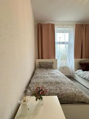 Ein Bett oder Betten in einem Zimmer der Unterkunft Apartments Brunsbüttel 2