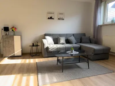 Ein Sitzbereich in der Unterkunft Haus Sonneneck Souterrain Wohnung 4
