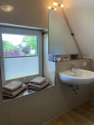 Ein Badezimmer in der Unterkunft Strandhaus Deichvoigt