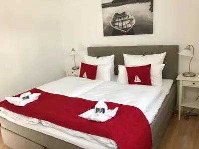 Ein Bett oder Betten in einem Zimmer der Unterkunft Boardinghouse