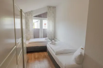 Ein Bett oder Betten in einem Zimmer der Unterkunft Boardinghouse