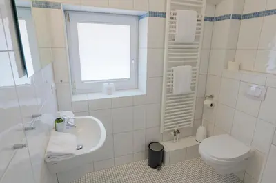 Ein Badezimmer in der Unterkunft Boardinghouse