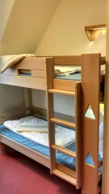 Ein Etagenbett oder Etagenbetten in einem Zimmer der Unterkunft Jugendherberge Otterndorf