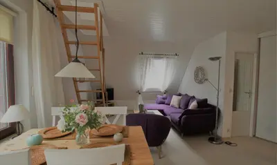 Ein Bett oder Betten in einem Zimmer der Unterkunft Ferienhaus Sternmöwe Cuxhaven