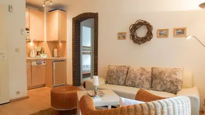 Ein Sitzbereich in der Unterkunft Ferienhaus Sternmöwe Cuxhaven