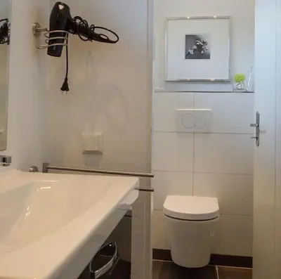 Ein Badezimmer in der Unterkunft Ferienhaus Sternmöwe Cuxhaven