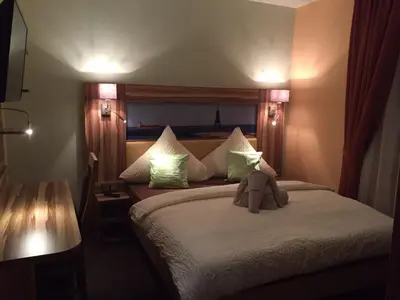 Ein Bett oder Betten in einem Zimmer der Unterkunft Hotel Meereswoge
