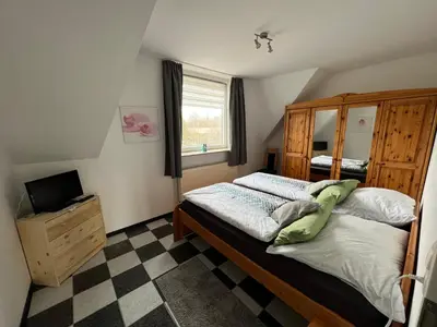 Ein Bett oder Betten in einem Zimmer der Unterkunft Im Heidedorf Haus to Baben