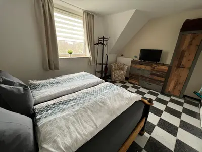 Ein Bett oder Betten in einem Zimmer der Unterkunft Im Heidedorf Haus to Baben
