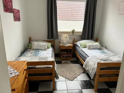 Ein Bett oder Betten in einem Zimmer der Unterkunft Im Heidedorf Haus to Baben