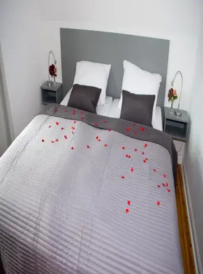 Ein Bett oder Betten in einem Zimmer der Unterkunft Gärtnerhaus