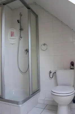 Ein Badezimmer in der Unterkunft GLÜCKSHAUS Ferienwohnung