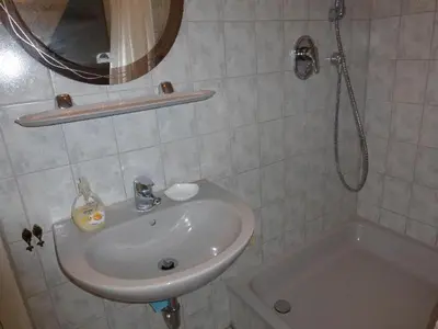 Ein Badezimmer in der Unterkunft westerwarft 10