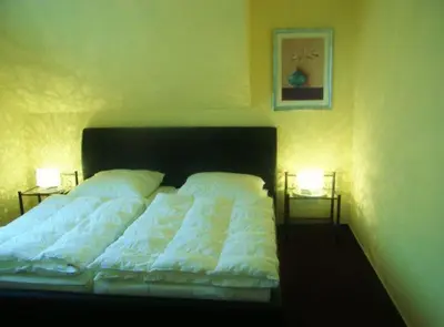 Ein Bett oder Betten in einem Zimmer der Unterkunft Strandresidenz Rosengarten - Wohnung Nr. 301