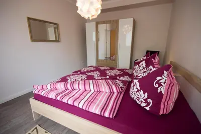 Ein Bett oder Betten in einem Zimmer der Unterkunft Haus Frauenpreiss Whg. 52