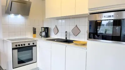 Küche/Küchenzeile in der Unterkunft Strandhaus Nordseebrandung Fewo A4.2