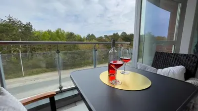 Ein Balkon oder eine Terrasse in der Unterkunft Strandhaus Nordseebrandung Fewo A4.2