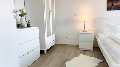 Ein Bett oder Betten in einem Zimmer der Unterkunft Strandhaus Nordseebrandung Fewo A4.2