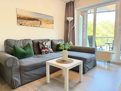 Ein Sitzbereich in der Unterkunft Strandhaus Nordseebrandung Fewo A1.4