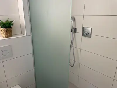 Ein Badezimmer in der Unterkunft Strandhaus Nordseebrandung Fewo A1.5