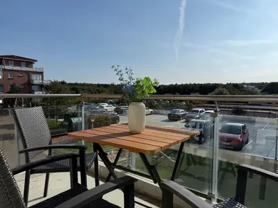 Ein Balkon oder eine Terrasse in der Unterkunft Strandhaus Nordseebrandung Fewo B1.1