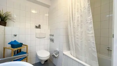 Ein Badezimmer in der Unterkunft Strandhaus Nordseebrandung Fewo B4.1