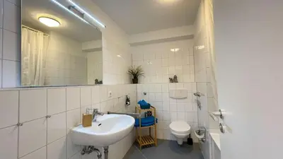 Ein Badezimmer in der Unterkunft Strandhaus Nordseebrandung Fewo B4.1