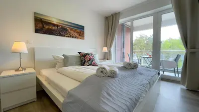 Ein Bett oder Betten in einem Zimmer der Unterkunft Strandhaus Nordseebrandung Fewo A3.3