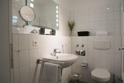 Ein Badezimmer in der Unterkunft Strandhaus Nordseebrandung Fewo B3.4