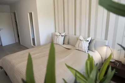 Ein Bett oder Betten in einem Zimmer der Unterkunft Strandhaus Nordseebrandung Fewo B3.4
