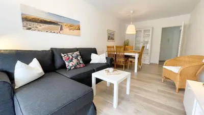 Ein Sitzbereich in der Unterkunft Strandhaus Nordseebrandung Fewo A5.1