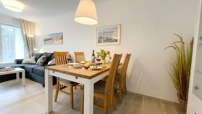 Ein Sitzbereich in der Unterkunft Strandhaus Nordseebrandung Fewo A5.1