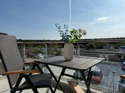 Ein Balkon oder eine Terrasse in der Unterkunft Strandhaus Nordseebrandung Fewo B2.1