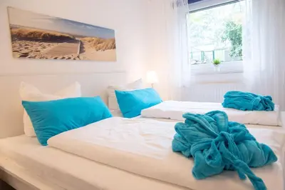 Ein Bett oder Betten in einem Zimmer der Unterkunft Haus Kirsten, Fewo Nr. 1