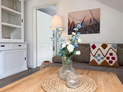 Ein Sitzbereich in der Unterkunft Haus Kirsten, Fewo Nr. 3