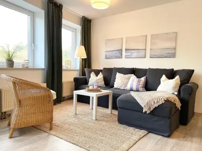 Ein Sitzbereich in der Unterkunft Strandhaus Nordseebrandung Fewo A3.2