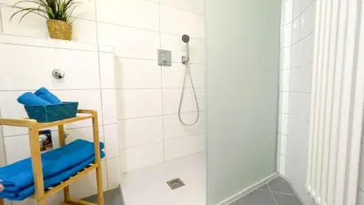 Ein Badezimmer in der Unterkunft Strandhaus Nordseebrandung Fewo A3.2
