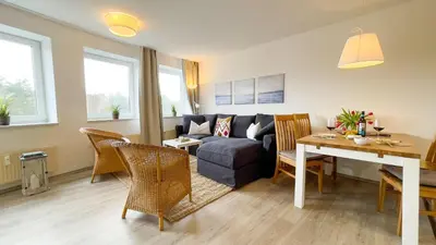 Ein Sitzbereich in der Unterkunft Strandhaus Nordseebrandung Fewo C1.4