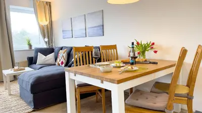 Ein Sitzbereich in der Unterkunft Strandhaus Nordseebrandung Fewo C1.4